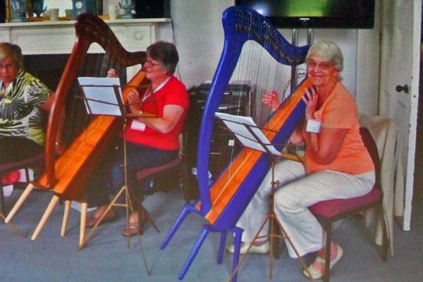 7. Linda on a course at Denman -learning to play the harp!.jpg